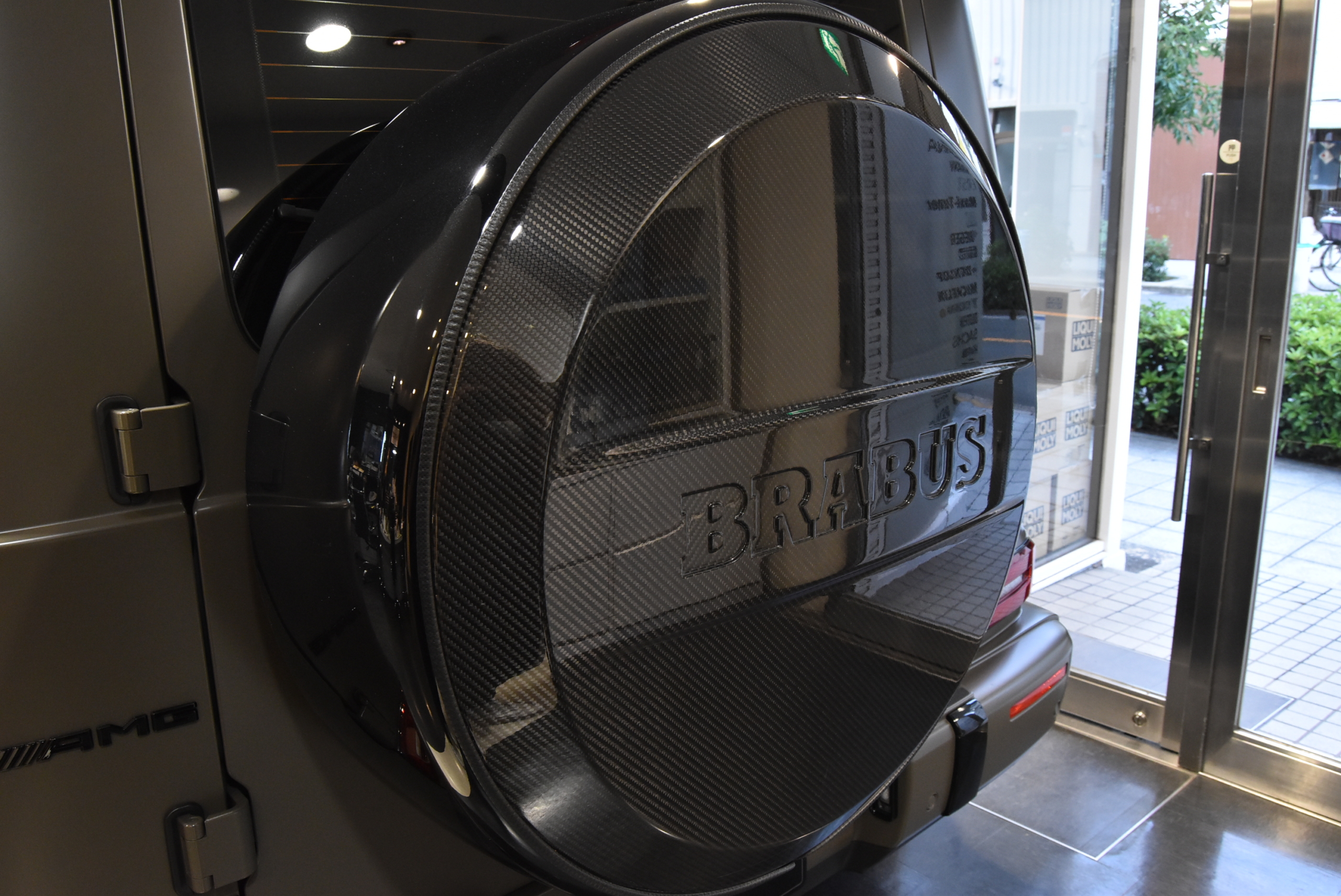 限定車MANUFAKTURエディション 左ハンドル BRABUSマフラー 1221ホイール BRABUSフロントリップ BRABUSカーボンボンネットパネル BRABUS背面タイヤカバー 本国純正OPバンパーガード BRABUSグリルエンブレム