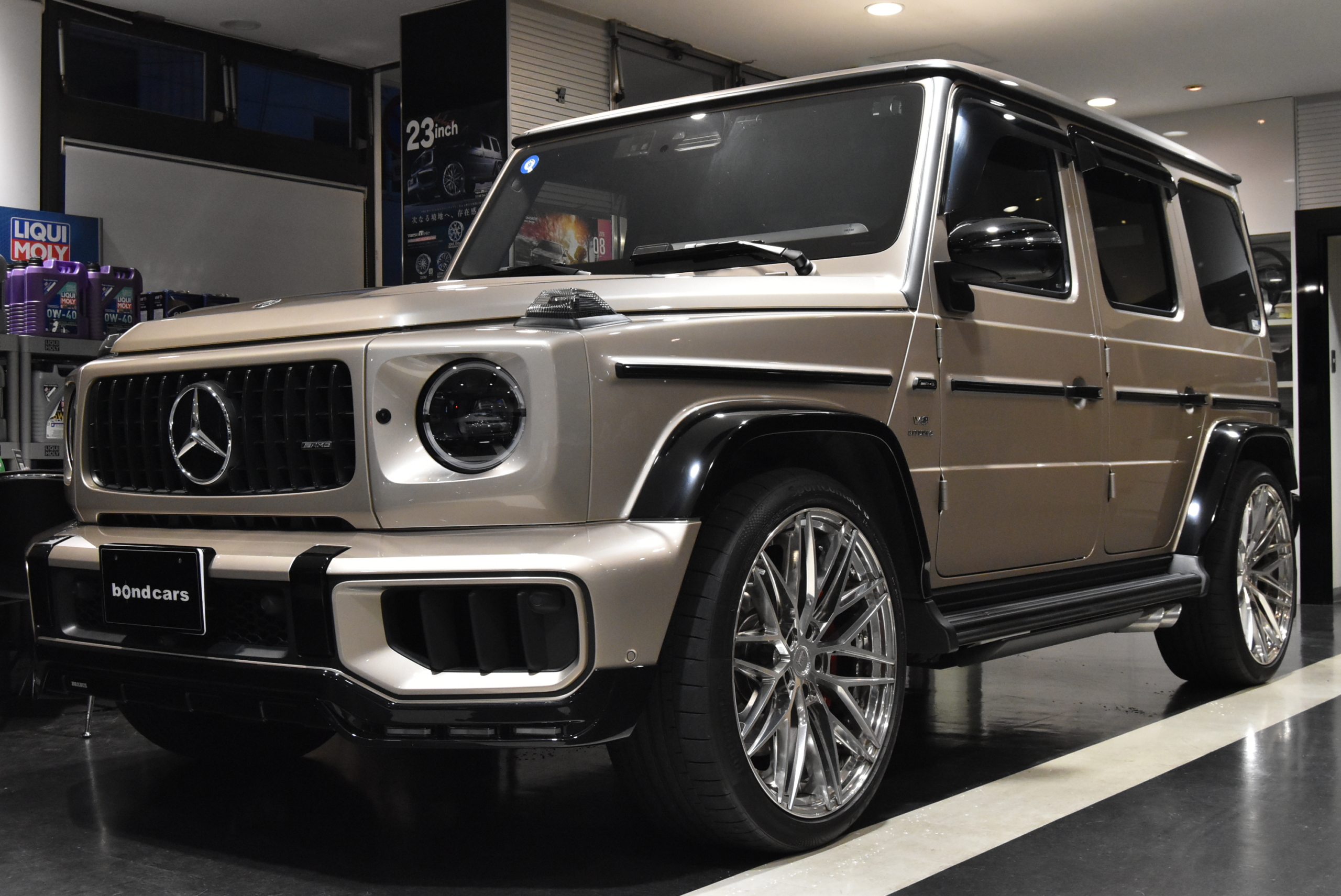 W465 G63　左Ｈ　 トラバーチンベージュ/プラチナホワイトナッパレザー MANUFAKTUR Program Plus AMGナイトパッケージ BC Forged 23インチホイール BRABUSフロントリップ　 各部ラッピング　 ＩＩＤローダウンサス　 ＩＩＤ電動サイドステップ レーダー＆ドライブレコーダー